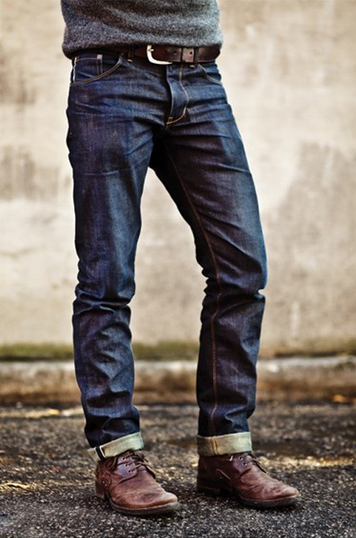 cuffed dark wash jeans covering Boots | SOLETOPIA