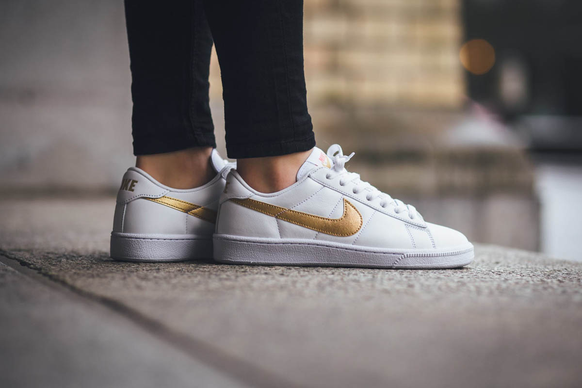 white and gold nikes